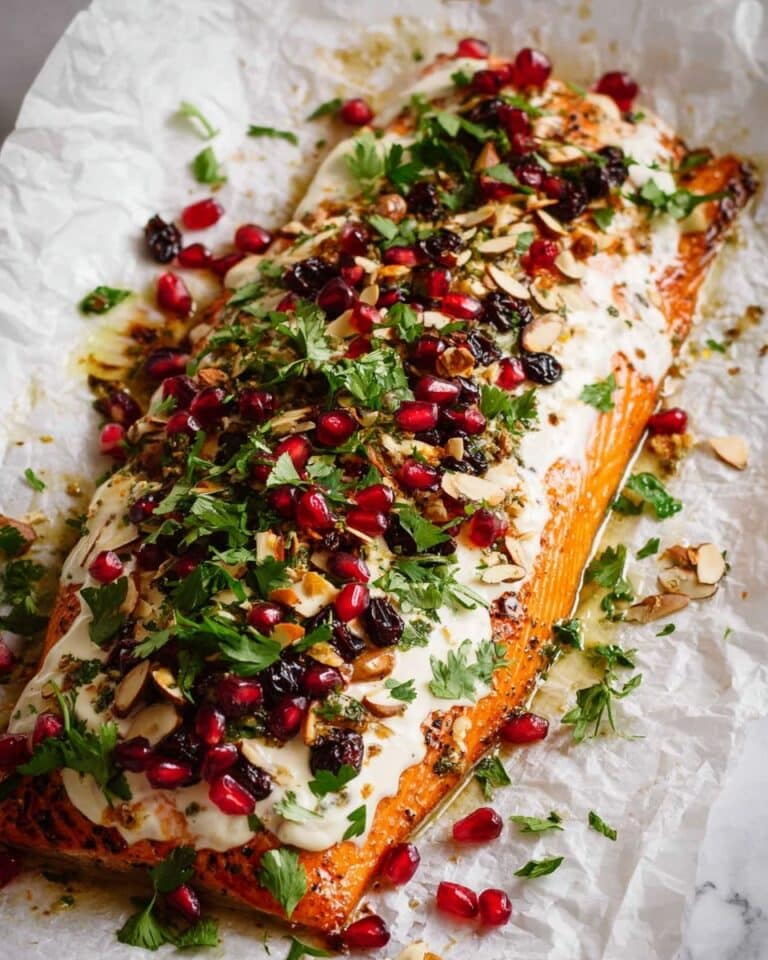 Christmas Baked Salmon with Creamy Dill Sauce, Cranberry Orange Tapenade, and Pomegranate Seeds Recipe