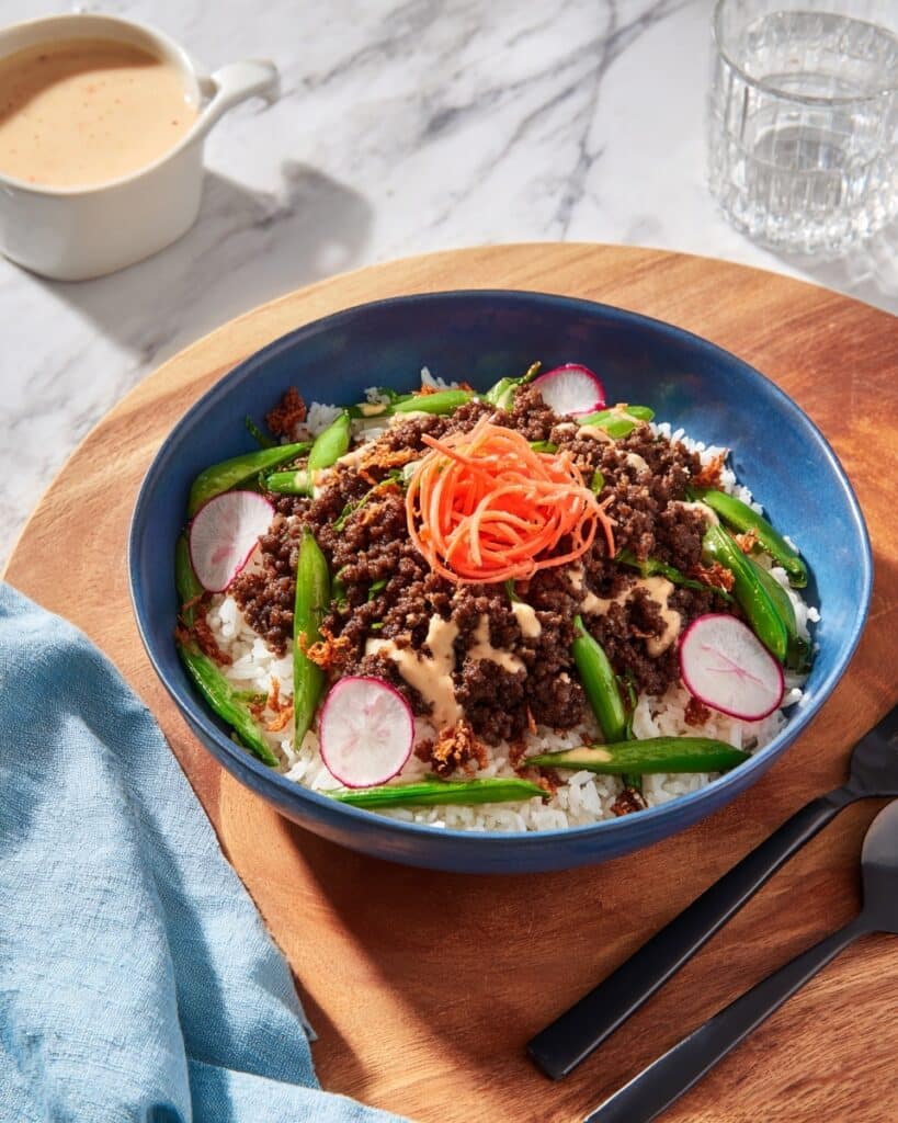 Sticky Ginger Beef and Rice Bowls with Marinated Veggies and Snap Peas Recipe