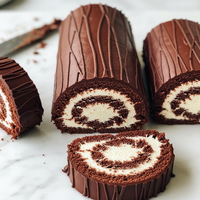 A chocolate roll cake is shown on a white marbled surface, covered in a smooth dark chocolate icing with vertical lines on top. The roll is sliced to reveal two layers: a soft, dark brown chocolate sponge cake wrapped around a thick, creamy white filling that spirals inside. The outside layer of dark chocolate icing looks glossy and thick, covering the entire roll. There is a knife with some chocolate crumbs on the marbled surface behind the rolls. photo taken with an iphone --ar 4:5 --v 7