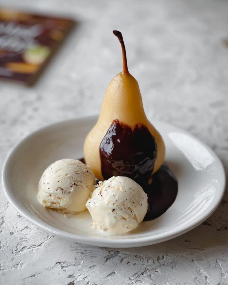 Champagne Poached Pears with Dark Chocolate Fudge Sauce Recipe