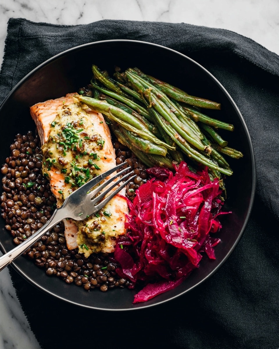 A black bowl holds a layered dish starting with a base of dark brown lentils covering the bottom. On top, there are three main layers: in the front, a piece of golden yellow grilled fish with herbs and black pepper sprinkled over it; to the right, sautéed green beans with some charred parts and bits of seasoning; and at the back, a mound of bright red shredded cabbage. A silver spoon is partially placed into the lentils near the fish, and a woman's hand holds the bowl from the side. The background is dark, and the photo is sharp and close-up. photo taken with an iphone --ar 4:5 --v 7